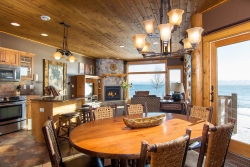 Image of This quaint one bedroom cottage offers beautiful lakeside views. There is a full kitchen and and a grill for your convenience. The cottage includes a queen size bed and is fully furnished throughout. The deck offers breathtaking views of the lake.